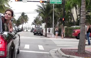 Two whores wave to passers-by while fucked in a car